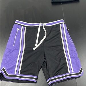 Jordan Craig Legacy Edition Athletic Shorts in Black and Purple